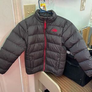 The Northface winter coat. Boys size M. Pre-owned.